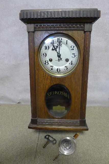 精工舎のゼンマイ式振り子時計の画像